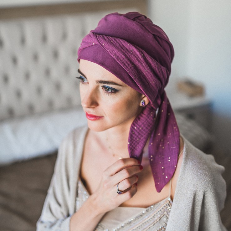 Primer plano del tejido de algodón y bambú del modelo Smooth Malva Gold.