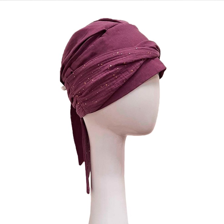 Detalle lateral del pañuelo Smooth Malva Gold en color malva.