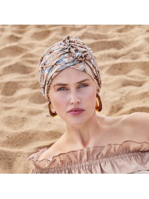 Turbante Lotus Touch of Gold con diseño elegante y detalle floral