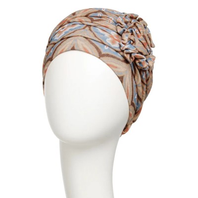 Turbante Lotus Touch of Gold con diseño elegante y detalle floral 2