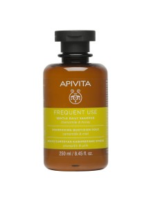 Envase del champú de uso frecuente con camomila y miel de APIVITA.